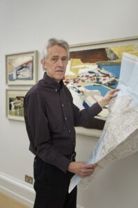 Jeremy looking at South West Coast map inside gallery