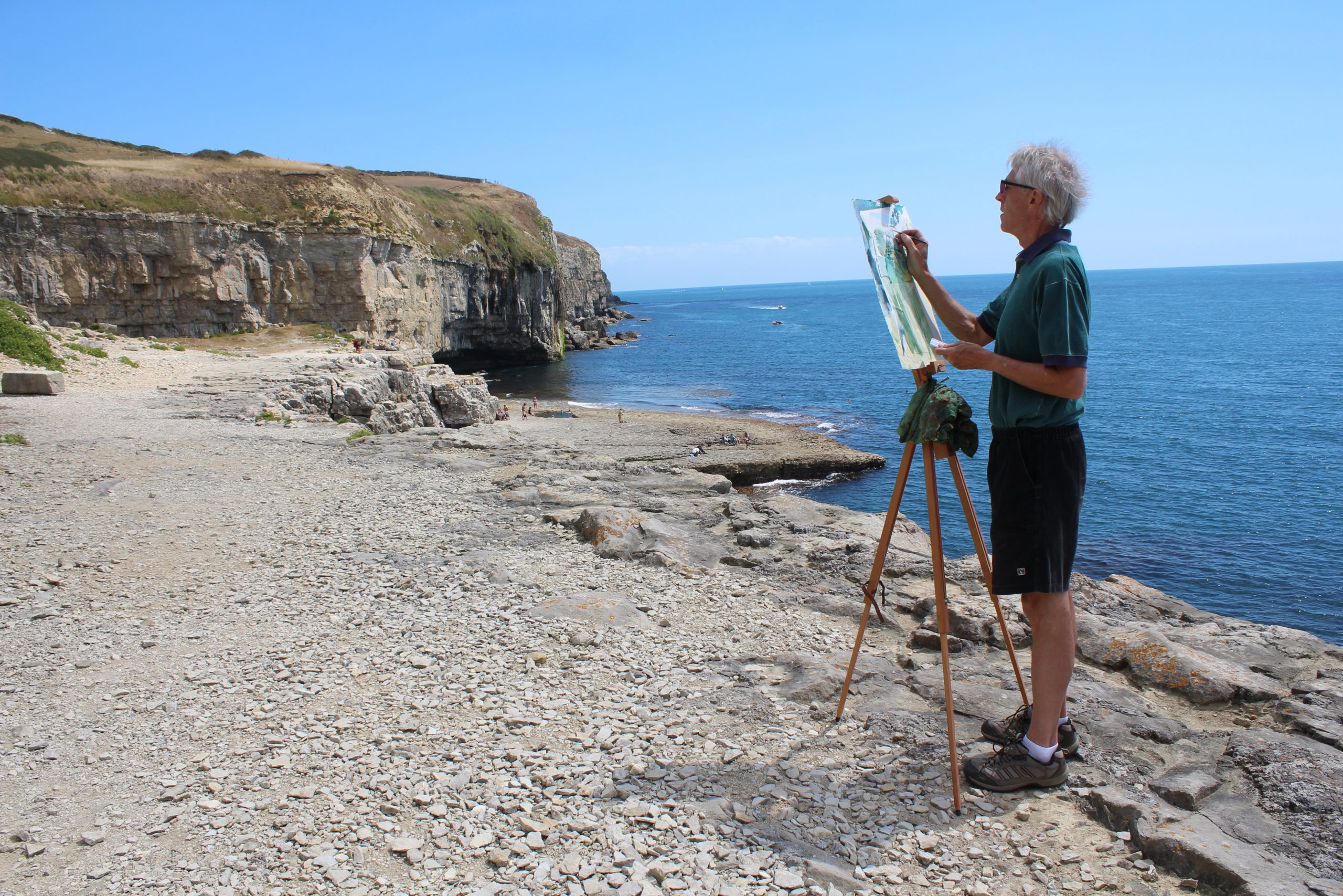 Jeremy Gardiner Painting plein air, Dancing Ledge, Dorset